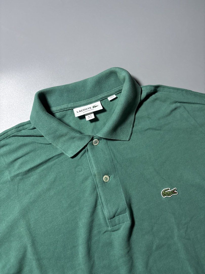 Lacoste polo shirt (Category: Tshirts & Polo Shirts ) located in Manila. Submitted by austinace04 (Listing ID 1460938845, Image 3). Description: - Good As New - Size L On Tag - 22 x 28 - Issue None.
