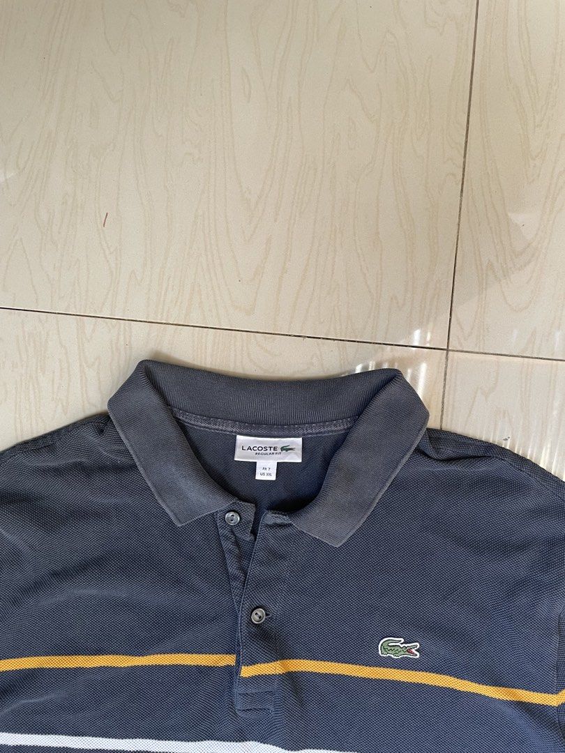 Lacoste Striped Polo Shirt (Category: Tshirts & Polo Shirts ) located in Zamboanga. Submitted by guthens (Listing ID 1461005362, Image 2). Description: Condition- excellent Issue- none Color rate- 9.5/10 Measurement- 24x28.