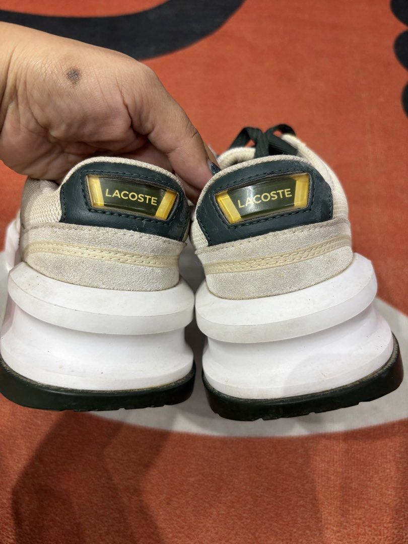 Lacoste White and Green Sneakers (Category: Sneakers) located in Alicia. Submitted by thriftbagph (Listing ID 1461078433, Image 3). Description: - White and green Lacoste sneakers - Lace-up style - Chunky sole - Iconic Lacoste logo on side and heel - Perfect for casual wear - Shows some signs of wear, but plenty of life left.