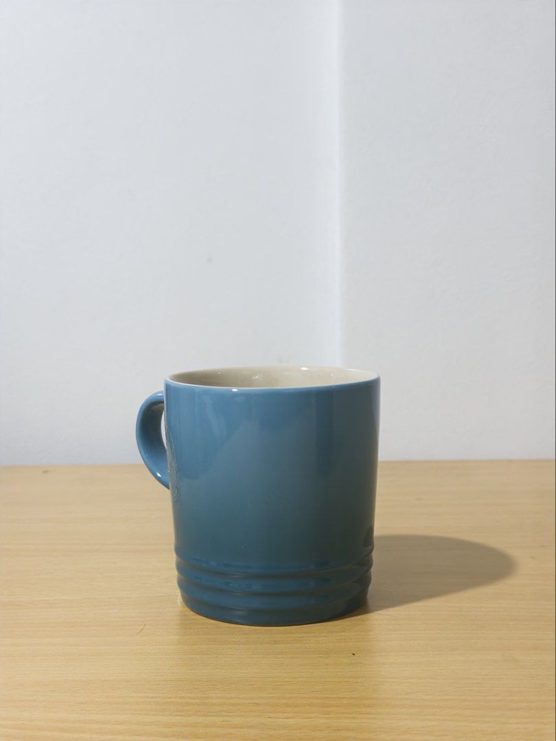 Le Creuset Stoneware Mug - Caribbean (Category: Coffee & Tea Tableware) located in Manila. Submitted by jaggylejano (Listing ID 1461022868, Image 1). Description: - Le Creuset blue stoneware mug - Classic design with ribbed detailing - Ideal for coffee or tea - Dishwasher and microwave safe .