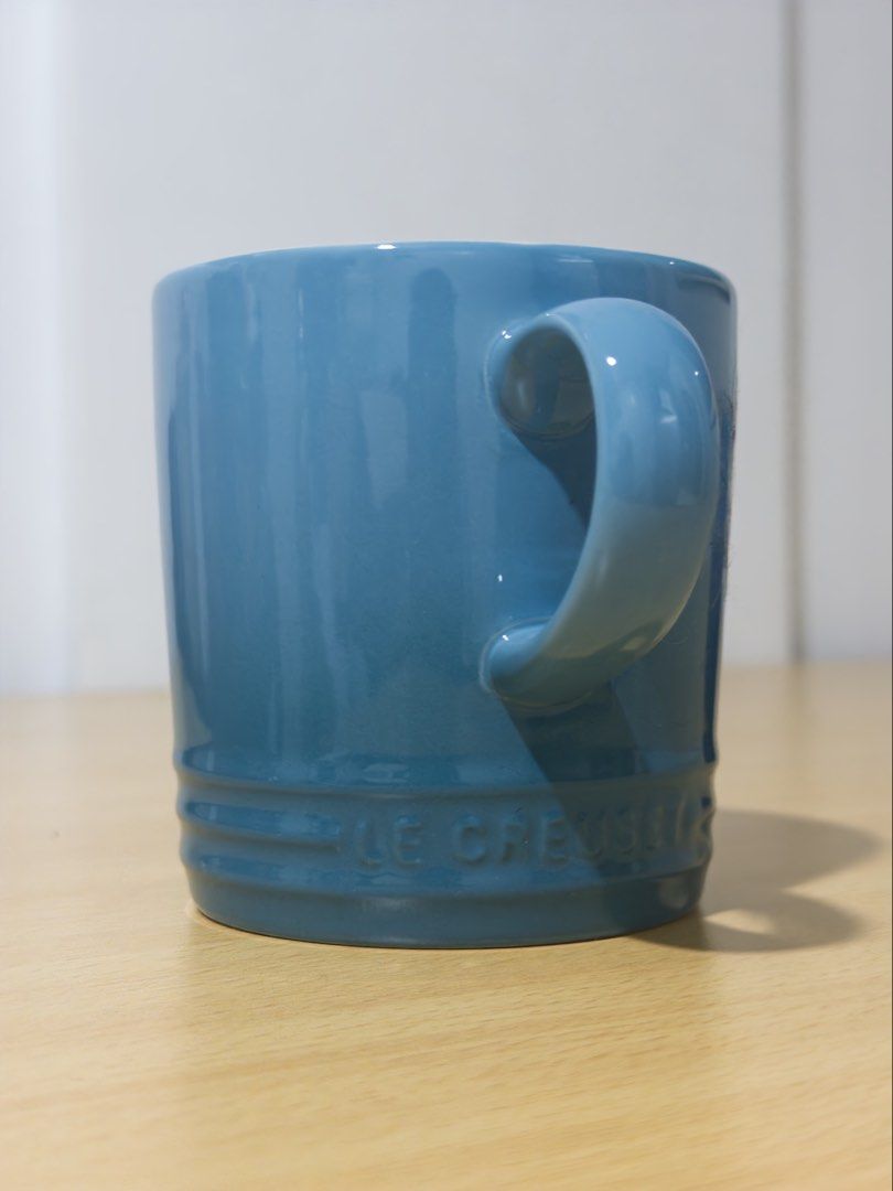 Le Creuset Stoneware Mug - Caribbean (Category: Coffee & Tea Tableware) located in Manila. Submitted by jaggylejano (Listing ID 1461022868, Image 2). Description: - Le Creuset blue stoneware mug - Classic design with ribbed detailing - Ideal for coffee or tea - Dishwasher and microwave safe .