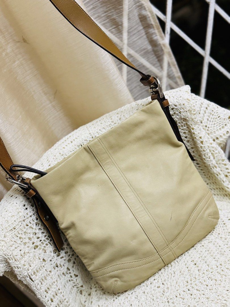 Leather Hobo Shoulder Bag Beige (Category: Luxury Bags & Wallets) located in Bacolod City. Submitted by vintage_vogue6100 (Listing ID 1461043107, Image 3). Description: - Material: Natural Cowhide Leather - Color: Beige with Brown Leather Straps - Closure: Top Zipper - Exterior Pocket: 1 Zip Pocket - Interior Pockets: 1 Zip Pocket, Slip Pockets - Serial Number: J0782-F10938 - Style: Great everyday bag.