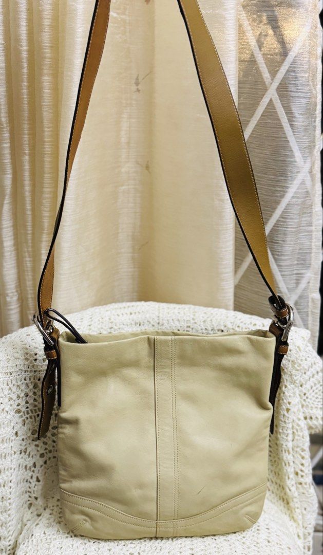 Leather Hobo Shoulder Bag Beige (Category: Luxury Bags & Wallets) located in Bacolod City. Submitted by vintage_vogue6100 (Listing ID 1461043107, Image 1). Description: - Material: Natural Cowhide Leather - Color: Beige with Brown Leather Straps - Closure: Top Zipper - Exterior Pocket: 1 Zip Pocket - Interior Pockets: 1 Zip Pocket, Slip Pockets - Serial Number: J0782-F10938 - Style: Great everyday bag.