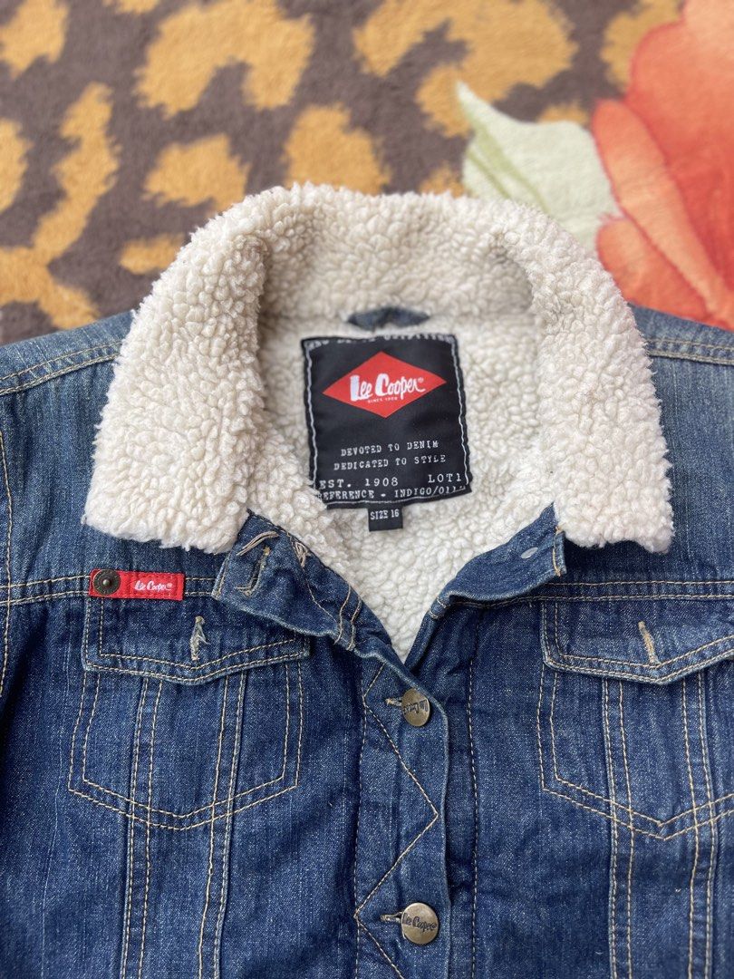 Lee Cooper Denim Jacket with Sherpa Collar - Size 16 (Category: Coats, Jackets and Outerwear) located in Manila. Submitted by aikyy_ (Listing ID 1460921794, Image 2). Description: - Classic blue denim jacket by Lee Cooper - Features warm sherpa fleece lining and collar - Button-up front with two chest pockets - Ideal for cooler weather - Made from 100% cotton - Size 16.