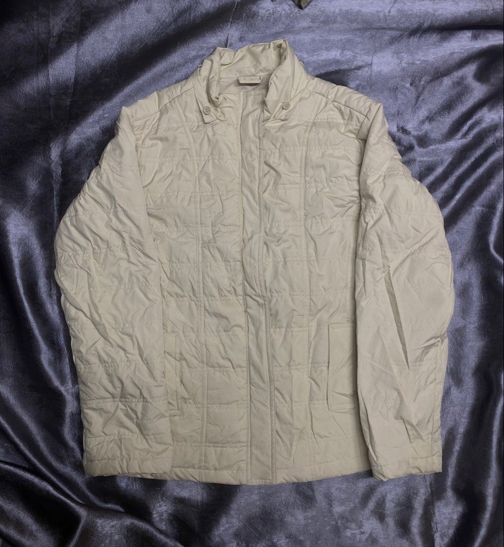 Lemon Tree Sports Quilted Jacket (Category: Coats, Jackets and Outerwear) located in Manila. Submitted by kevinthriftshop (Listing ID 1461052222, Image 1). Description: - Cream colored quilted jacket - Brand: Lemon Tree Sports - Zip-up front with button closure at the collar - Two front pockets - Lightweight and comfortable - Ideal for layering Location: Cavite.