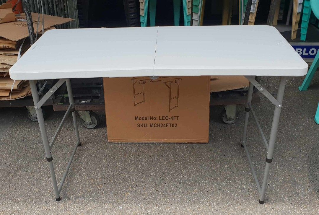 Leo 4Ft Folding Table Fokd in Half Rectangular Table Heavy Duty Utility Table Space Saving Features Convenient carrying handle Adjustable height setting Color White (Category: Dinnerware & Cutlery) located in Tayabas. Submitted by lovelyalcaraz (Listing ID 1460931511, Image 1). Description: Leo 4Ft Folding Table Fokd in Half Rectangular Table Heavy Duty Utility Table Space Saving Features Convenient carrying handle Adjustable height setting Color