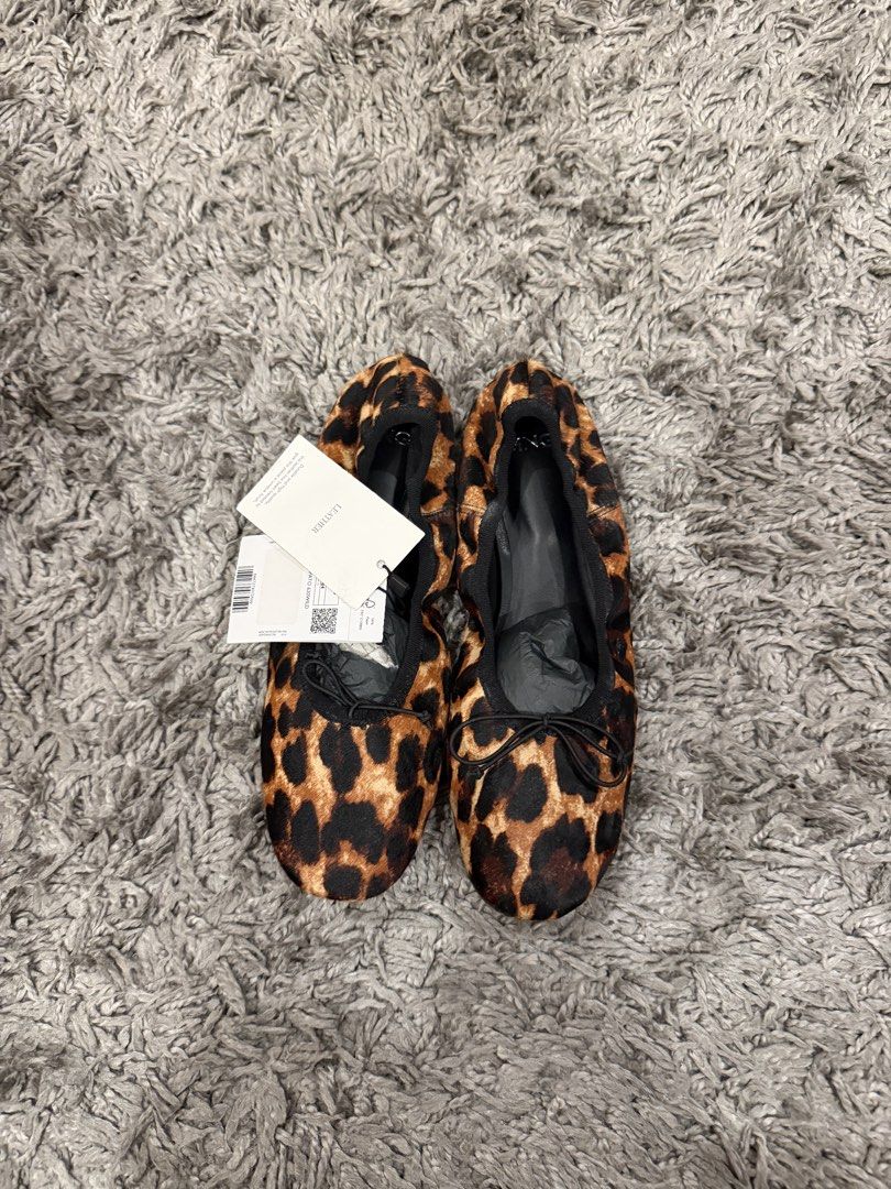 Leopard Print Ballet Flats with Bow Detail (Category: Flats & Sandals) located in Pasig City. Submitted by CuratedProj (Listing ID 1461049104, Image 1). Description: - Adorable leopard print ballet flats - Made with soft, comfortable material - Features a cute little bow detail at the front - Brand new with tags attached - Versatile for everyday wear or dressing up.