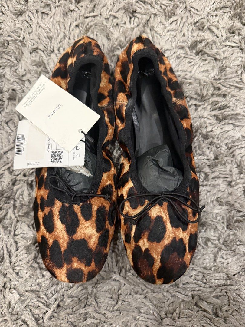 Leopard Print Ballet Flats with Bow Detail (Category: Flats & Sandals) located in Pasig City. Submitted by CuratedProj (Listing ID 1461049104, Image 2). Description: - Adorable leopard print ballet flats - Made with soft, comfortable material - Features a cute little bow detail at the front - Brand new with tags attached - Versatile for everyday wear or dressing up.