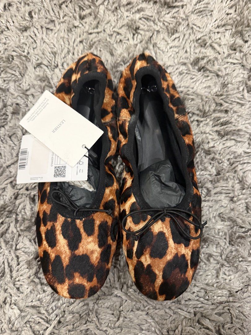 Leopard Print Ballet Flats with Bow Detail (Category: Flats & Sandals) located in Pasig City. Submitted by CuratedProj (Listing ID 1461049104, Image 3). Description: - Adorable leopard print ballet flats - Made with soft, comfortable material - Features a cute little bow detail at the front - Brand new with tags attached - Versatile for everyday wear or dressing up.