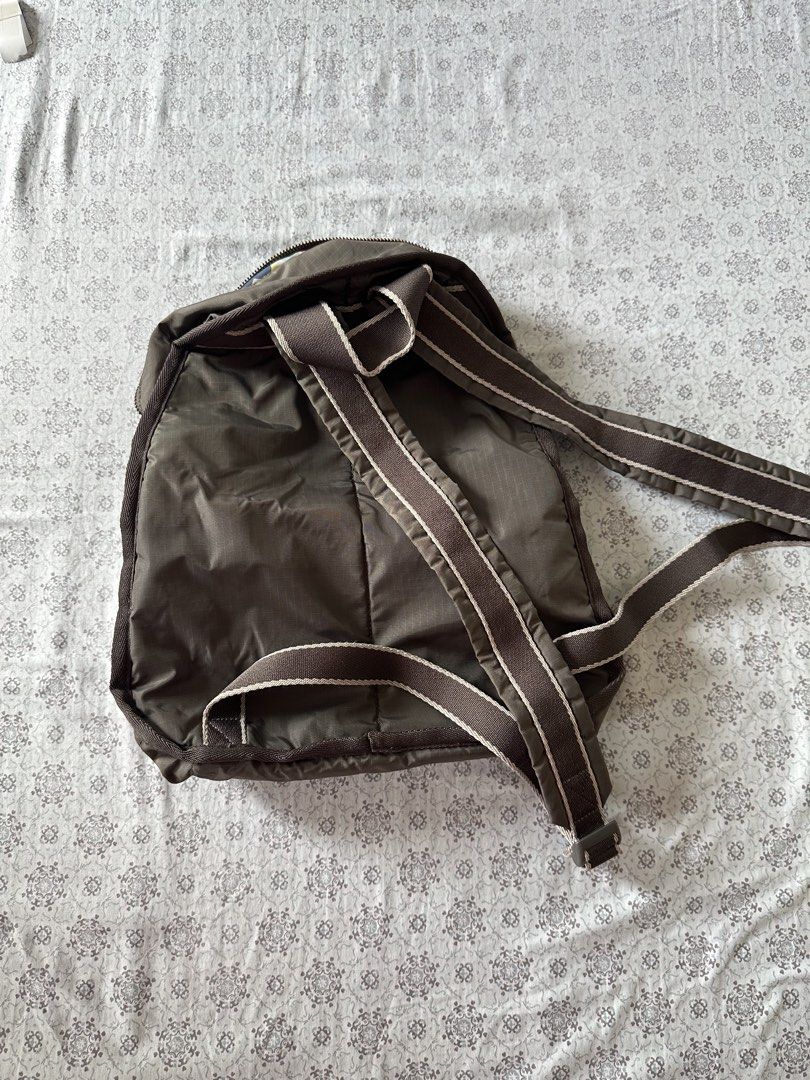 LeSportsac Backpack - Brown with Floral Interior (Category: Backpacks) located in Quezon City. Submitted by 4k_cam (Listing ID 1460961673, Image 3). Description: - Classic LeSportsac backpack in neutral brown. - Fun, colorful floral print interior lining. - Smooth working zippers. - Adjustable straps for comfort. - Ideal for everyday use or travel. - Plenty of interior space for essentials..