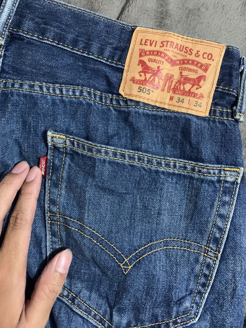 Levi's 505 Jeans W34 L34 (Category: Jeans) located in Manila. Submitted by fierceturtle-7be329 (Listing ID 1461035603, Image 3). Description: - Brand: Levi's - Model: 505 - Size: Waist 34, Length 34 - Color: Classic Blue Denim - Fit: Straight Fit - Condition: Good, with some fading on the front - Ideal for: Everyday wear.