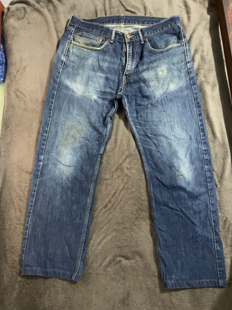 Levi's 505 Jeans W34 L34 (Category: Jeans) located in Manila. Submitted by fierceturtle-7be329 (Listing ID 1461035603, Image 2). Description: - Brand: Levi's - Model: 505 - Size: Waist 34, Length 34 - Color: Classic Blue Denim - Fit: Straight Fit - Condition: Good, with some fading on the front - Ideal for: Everyday wear.