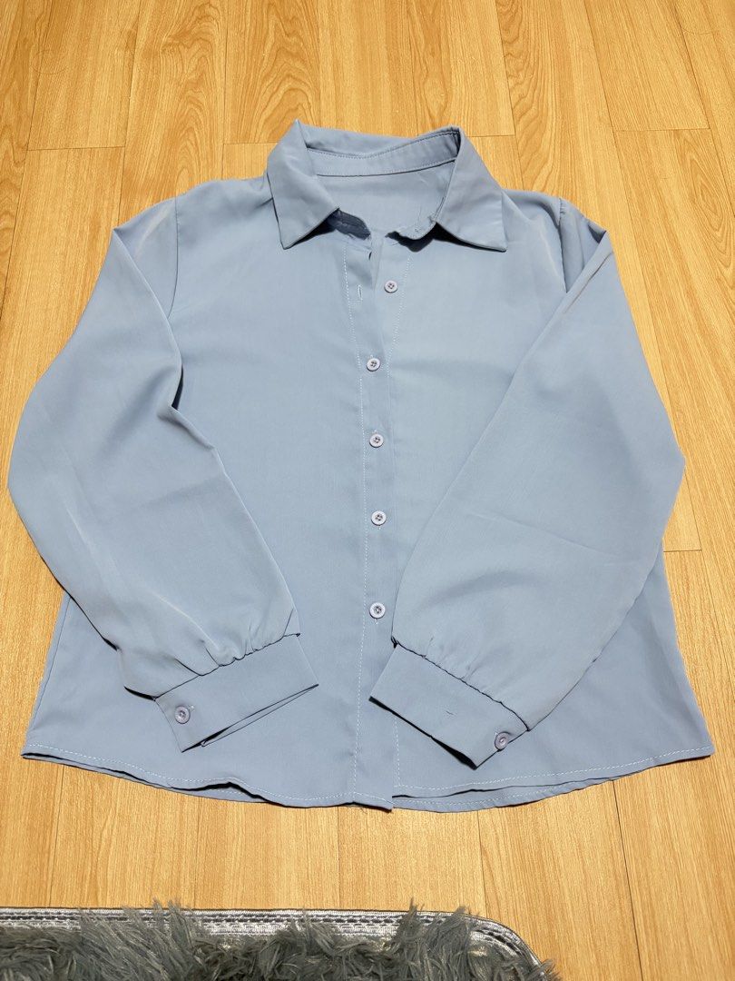 Light Blue Long Sleeve Button Up Shirt (Category: Others Tops) located in Pasig City. Submitted by alyannamm (Listing ID 1461091808, Image 1). Description: Worn once. Good as new. Color may vary due to lighting Mop:gcash/gotyme/maribank mod: lalamove/grab/lbc * discounts for same day delivery orders meet ups are also available.