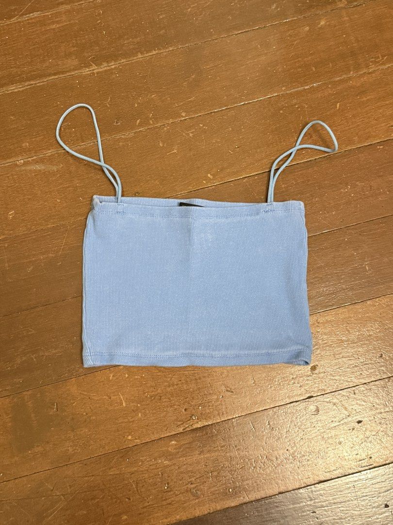 Light Blue Ribbed Spaghetti Strap Crop Top (Category: Sleeveless) located in Angeles City. Submitted by lesmiz24601 (Listing ID 1460975686, Image 1). Description: - Cute light blue ribbed crop top - Features spaghetti straps - Made of stretchy material - Best fits size Small or Medium - Ideal for summer wear or layering - Easily pairs with jeans or shorts.