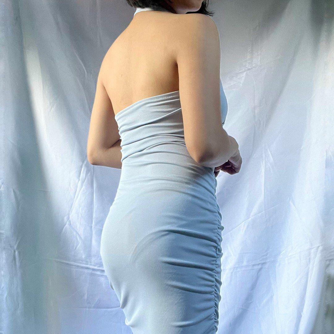 Light Blue Ruched Halter Neck Bodycon Mini Dress (Category: Dresses) located in Manila. Submitted by demi.rewears (Listing ID 1461069591, Image 3). Description: Light blue ruched halter neck bodycon mini dress. Stretchy fabric. Figure-hugging fit. Ideal for nights out. Size: Fits Extra Small to Small (Very Stretchable) Bust: Fits 24” to 33” (12.5” flat lay) Waist: Fits 16” to 27” (8” flat lay) Length: 27.5” (Mini dress).