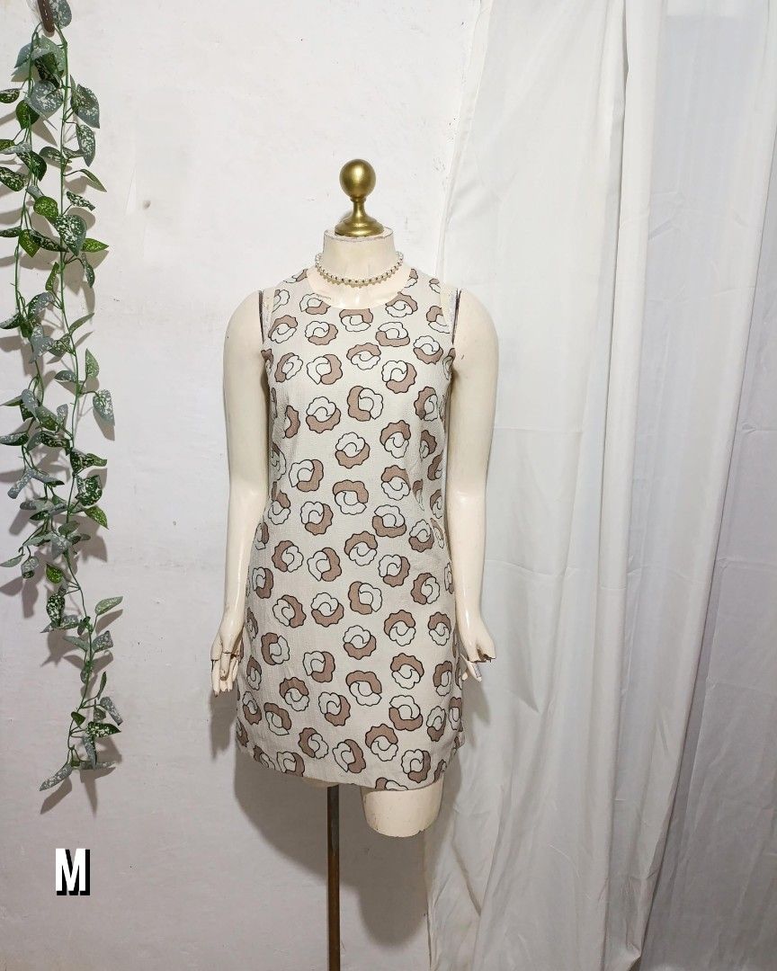 Light brown printed mini dress (Category: Dresses) located in Pateros City. Submitted by amj_amj (Listing ID 1461088203, Image 1). Description: .