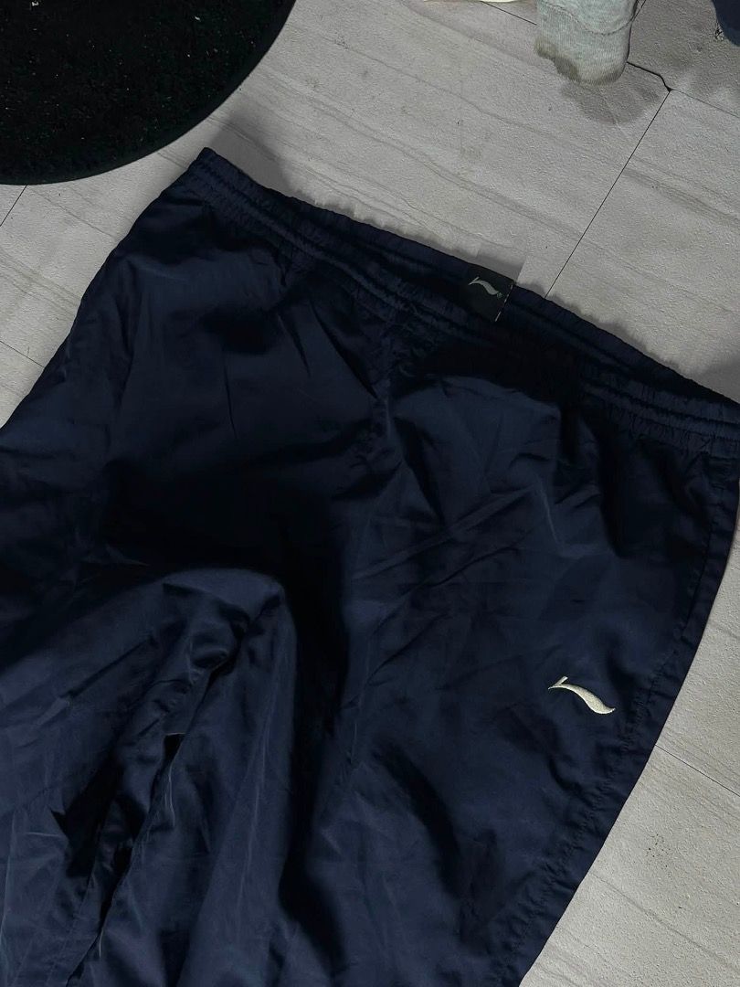 li-ning baggy track pants (Category: Joggers) located in Manila. Submitted by nb_thriftshop (Listing ID 1461078496, Image 2). Description: baggy track pants ( li ning ) waist 30 to 40 has lace length 41 leg hole 9.5 no issue washed.