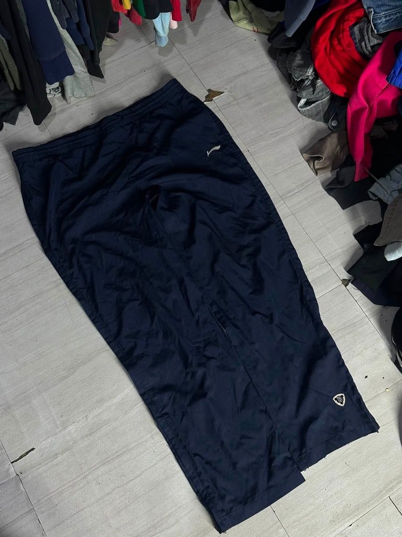 li-ning track pants (Category: Joggers) located in Manila. Submitted by nb_thriftshop (Listing ID 1461064102, Image 1). Description: li ning track pants waist 30 to 40 lenght 43 leg hole 9 thigh 14 no issue washed has lace.