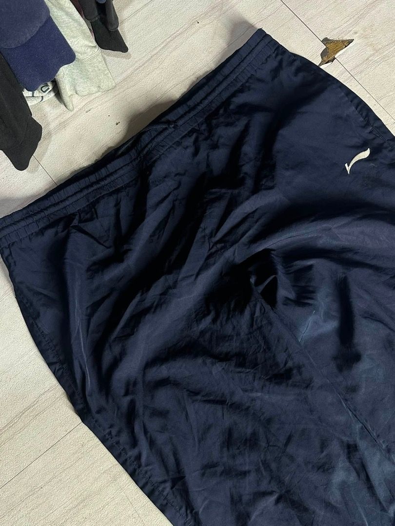 li-ning track pants (Category: Joggers) located in Manila. Submitted by nb_thriftshop (Listing ID 1461064102, Image 2). Description: li ning track pants waist 30 to 40 lenght 43 leg hole 9 thigh 14 no issue washed has lace.