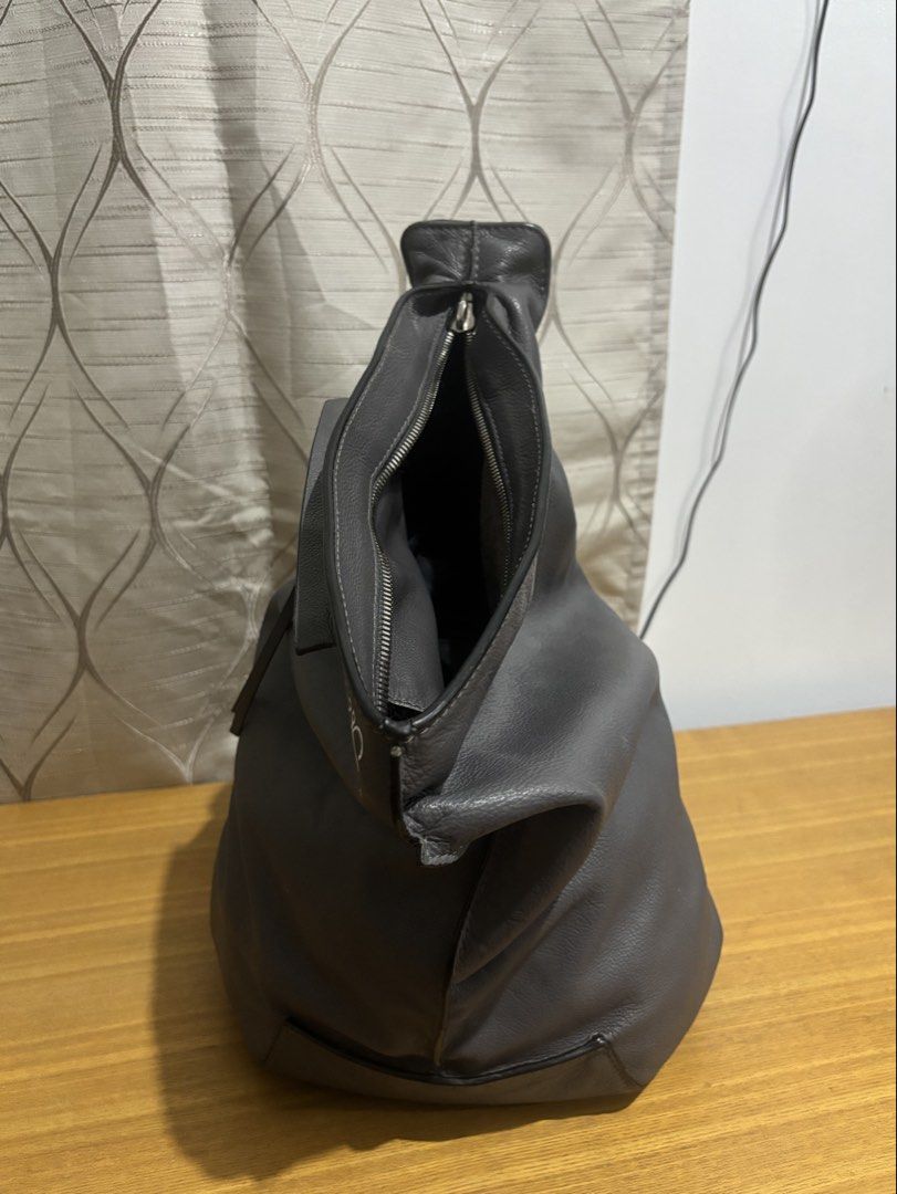 Loewe Anton Leather backpack (Category: Luxury Bags & Wallets) located in Calamba. Submitted by alnsurplus.028 (Listing ID 1461038664, Image 3). Description: Loewe Anton Leather Backpack/ Loewe Anton Sling bag/ Rucksack Issue: yung puller ng zipper sa main compartment Wala na (see photo) Ganda niyan malinis mabago pa Price still nego We ship nationwide Loc:Majada out, Calamba, Laguna .