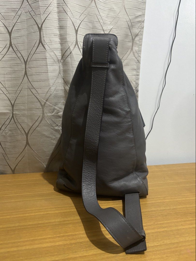 Loewe Anton Leather backpack (Category: Luxury Bags & Wallets) located in Calamba. Submitted by alnsurplus.028 (Listing ID 1461038664, Image 2). Description: Loewe Anton Leather Backpack/ Loewe Anton Sling bag/ Rucksack Issue: yung puller ng zipper sa main compartment Wala na (see photo) Ganda niyan malinis mabago pa Price still nego We ship nationwide Loc:Majada out, Calamba, Laguna .