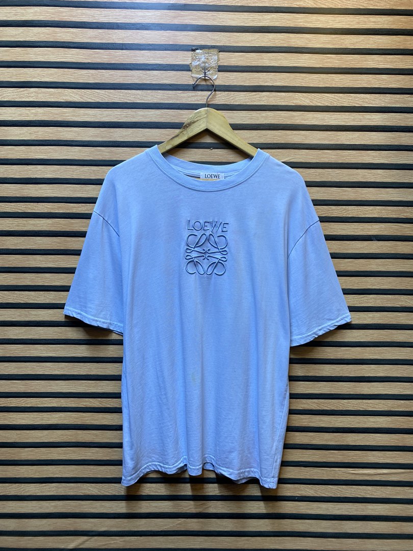 LOEWE “EMBROID DESIGN” TEE (Category: Tshirts & Polo Shirts ) located in Makati City. Submitted by drip.poww (Listing ID 1461091841, Image 1). Description: - Authentic - Color: Sky blue - Size: Large - Dimes: 22x28 - Authentic - Excellent condition - Need wash, fresh from bale - Material: 100% Cotton Please don’t expect too much—these are thrifted (ukay) items. 😊 !!STILL NEGOTIABLE!!.