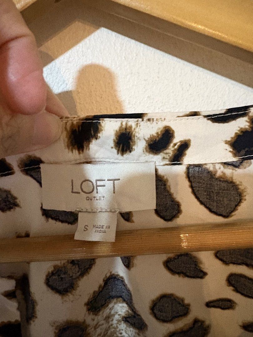 Loft by Ann Taylor Leopard print blouse (Category: Blouses) located in Pasig City. Submitted by teep_mnl (Listing ID 1460950021, Image 3). Description: This is a loose fit blouse with cut details from the colar to the puff sleeves and cropped cut. Measurement Shoulder: 14.5” Chest: 21” Length: 22.5” This was a pasalubong from the States but never got to wear it. No tags. .