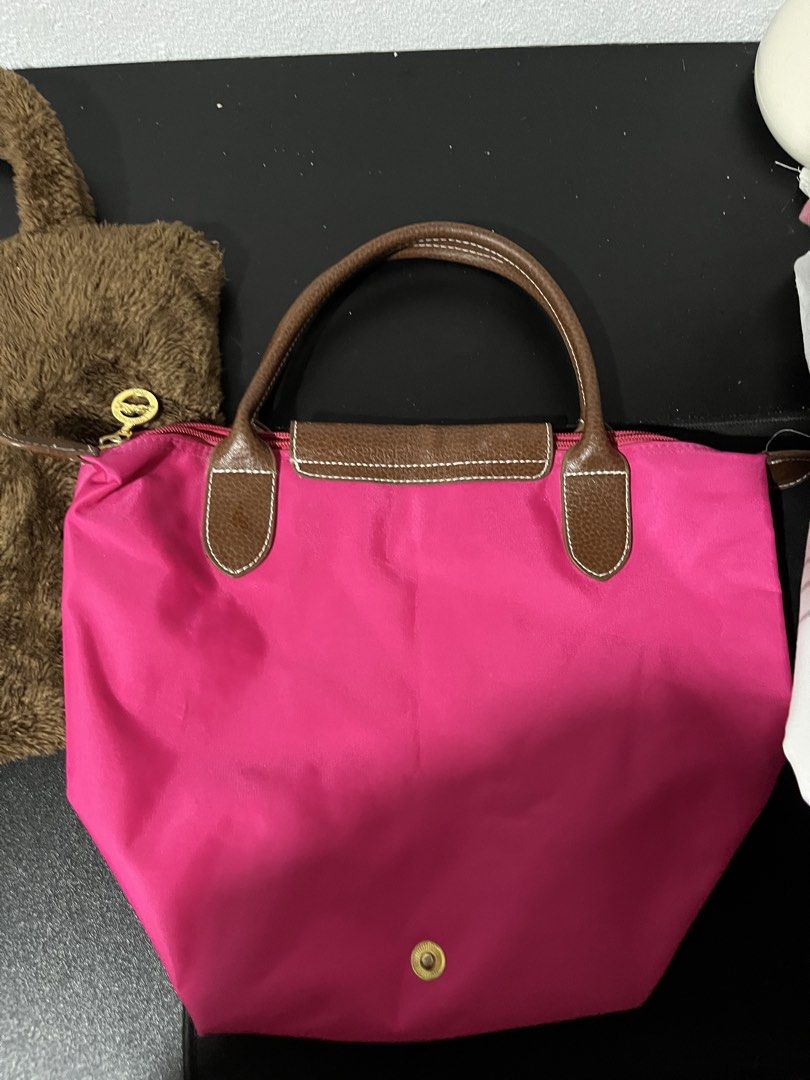 Long Champ and Brown Furr bag (Category: Shoulder Bags) located in Tuguegarao City. Submitted by wear.lyunji (Listing ID 1461036958, Image 3). Description: bundle bags.
