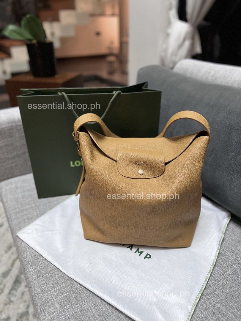 Longchamp Le Cadence L Shoulder Bag In Dulce (Category: Luxury Bags & Wallets) located in Manila. Submitted by essential.shop.ph (Listing ID 1461044863, Image 1). Description: PREORDER. 7-10 Days ETA ☺️ Longchamp Le Cadence L Shoulder Bag in Dulce ***Actual color difficult to capture due to lighting conditions. The leathers of Longchamp bags may have subtle variations. These reflect the vivid nature of the leathers used in our workshops and revea