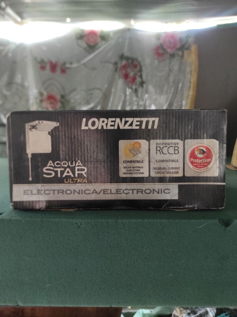 Lorenzetti Acqua Star Ultra Electronic Shower (Category: Bathroom & Kitchen Fixtures) located in Caloocan City. Submitted by jerry.coja14 (Listing ID 1460929328, Image 2). Description: - Lorenzetti Acqua Star Ultra Electronic Shower - Sleek Black and Chrome Finish - Powerful 220V, 6900W performance - Press Plus Technology for High Water Flow - Integrated Residual Current Circuit Breaker (RCCB) for Enhanced Safety - Compatible with Solar Heating S