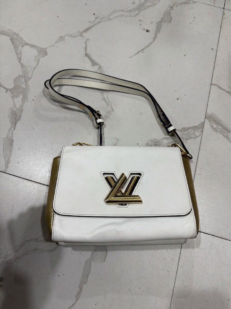Louis Vuitton (Category: Luxury Bags & Wallets) located in Bacolod City. Submitted by kitcarsonduff (Listing ID 1460958939, Image 1). Description: Louis Vuitton almost new Shoulder Bag featuring textured leather and a gold-tone LV twist-lock closure.