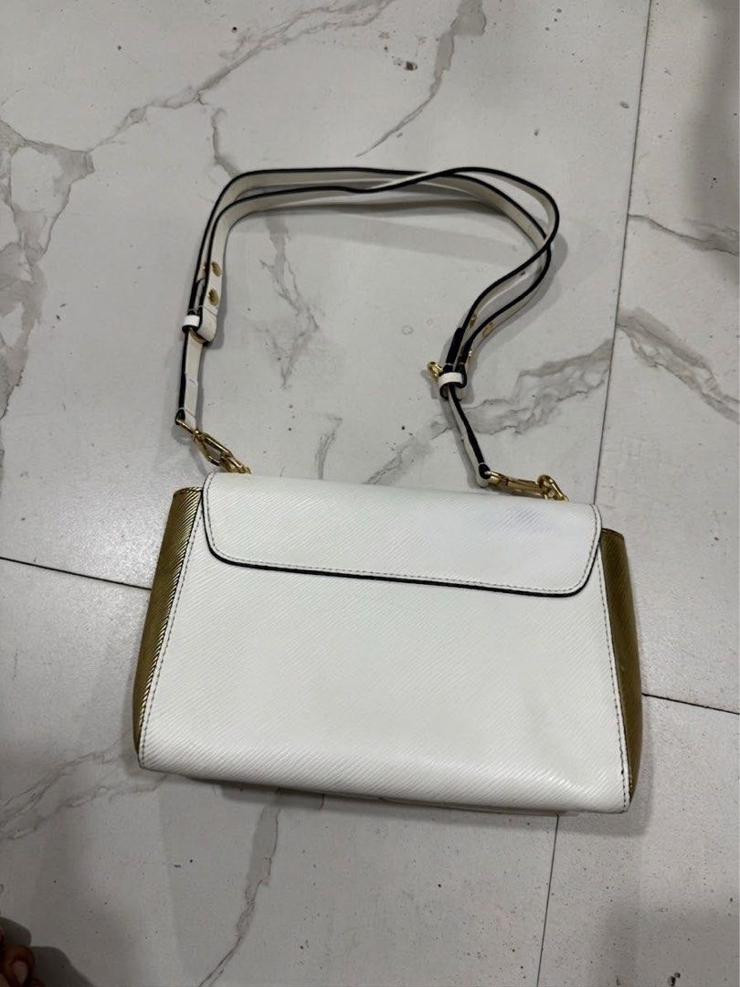 Louis Vuitton (Category: Luxury Bags & Wallets) located in Bacolod City. Submitted by kitcarsonduff (Listing ID 1460958939, Image 2). Description: Louis Vuitton almost new Shoulder Bag featuring textured leather and a gold-tone LV twist-lock closure.