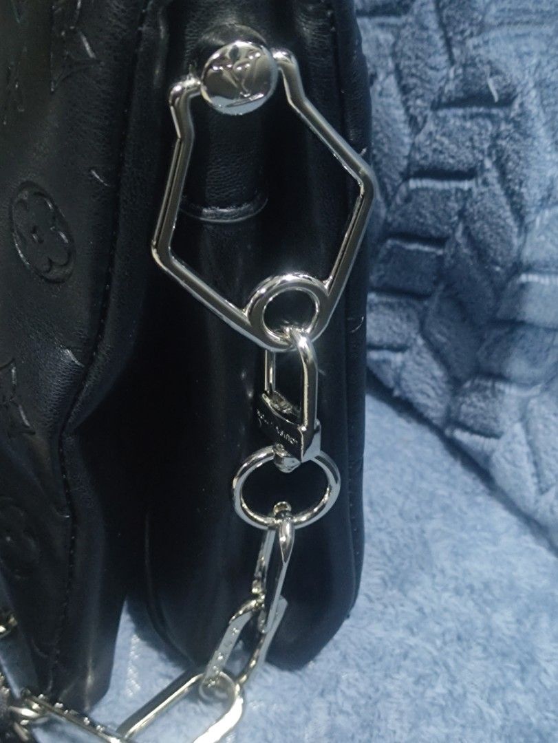 Louis Vuitton Black Monogram Embossed Clutch Bag with Chain (Category: Luxury Bags & Wallets) located in Cainta. Submitted by kluxurychoices (Listing ID 1461039621, Image 3). Description: Louis Vuitton Bag with shoulder chain with sling strap very nice in actual with dustbag .