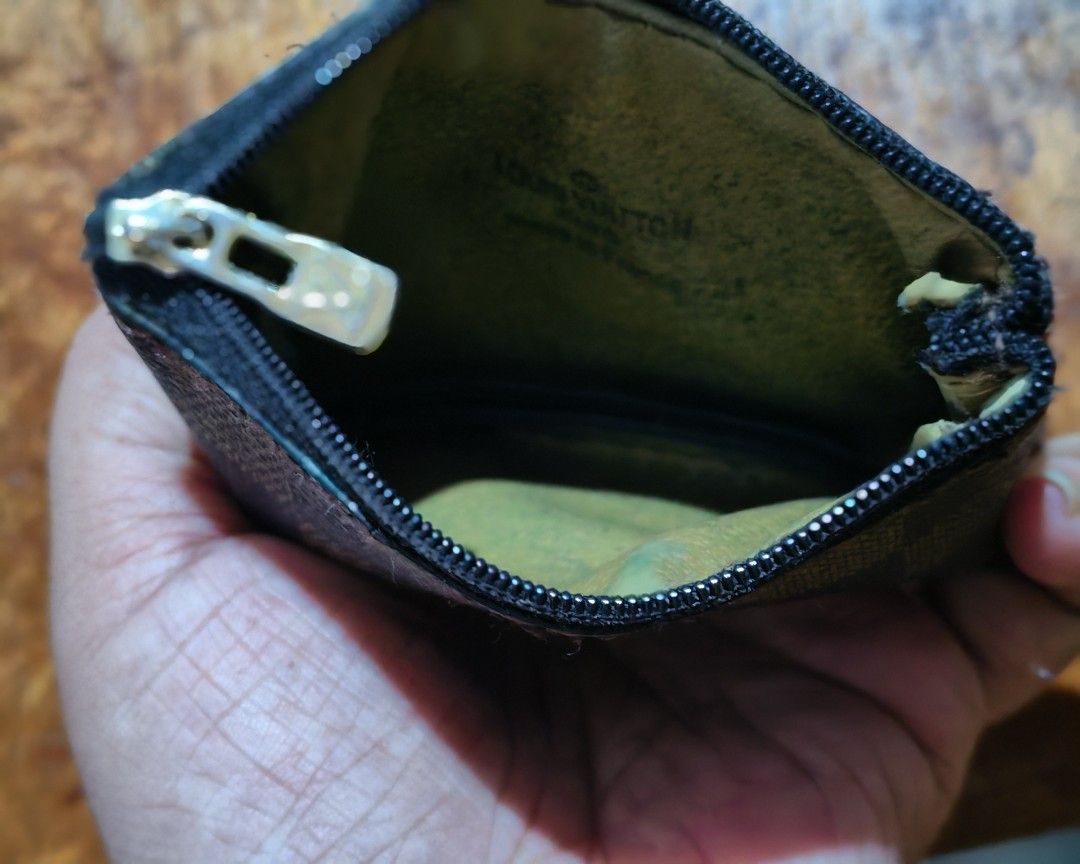 Louis Vuitton Damier Ebene Coin Pouch (Category: Luxury Bags & Wallets) located in Davao. Submitted by athenaprelovedph (Listing ID 1460935553, Image 2). Description: Louis Vuitton coin pouch - Classic Damier Ebene pattern - Zipper closure - Compact size for coins or small essentials.