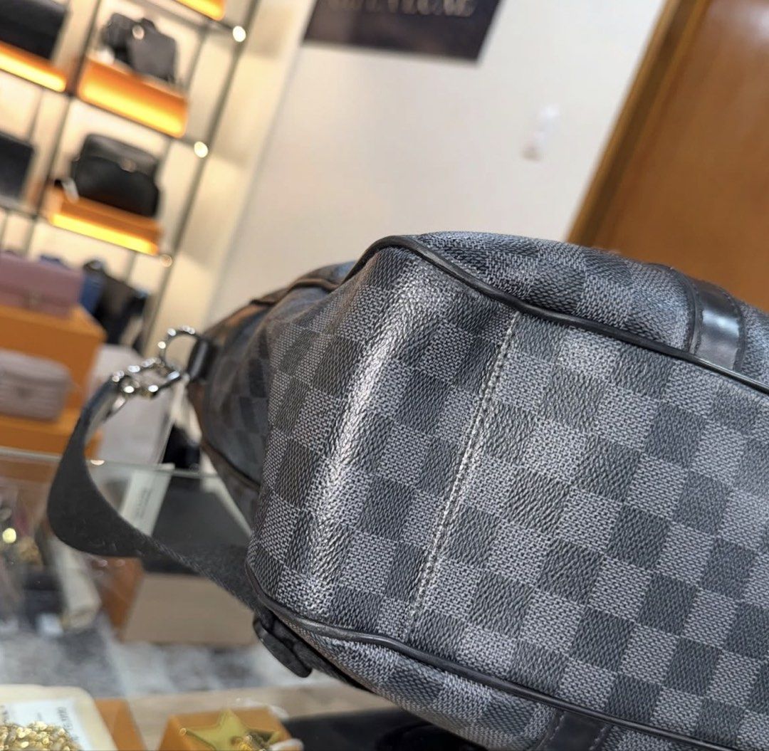 Louis Vuitton Damier Graphite Tadao Tower (Category: Luxury Bags & Wallets) located in Quezon City. Submitted by yukisassu (Listing ID 1460998297, Image 3). Description: - Authentic Louis Vuitton Damier Graphite Tadao tote bag - Spacious interior, ideal for travel or daily use - Dual top handles and a detachable shoulder strap - Versatile and stylish design - With Dust Bag - Guaranteed Authentic -With Poizon Online Authentication - no other inclu