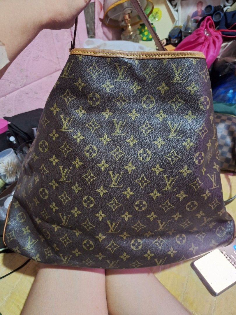 Louis Vuitton Delightful Monogram Shoulder Bag (Category: Luxury Bags & Wallets) located in Quezon City. Submitted by cloudymay (Listing ID 1460926879, Image 2). Description: - Classic Louis Vuitton shoulder bag - Iconic brown monogram canvas - Tan leather trim and straps - Gold hardware details - Large size - Spacious interior with multiple compartments - Perfect for everyday use - Noted: Some signs of wear on leather trim and straps.