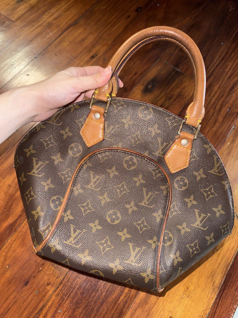 Louis Vuitton Monogram Ellipse Bag (Category: Luxury Bags & Wallets) located in Angeles City. Submitted by inahaldrienne (Listing ID 1460988654, Image 1). Description: - Classic Louis Vuitton Ellipse monogram bag - Color: Brown and tan canvas with leather trim - Closure: Zipper - Interior: One small pocket - Condition: Handles show wear, overall good vintage condition - A timeless and iconic piece.