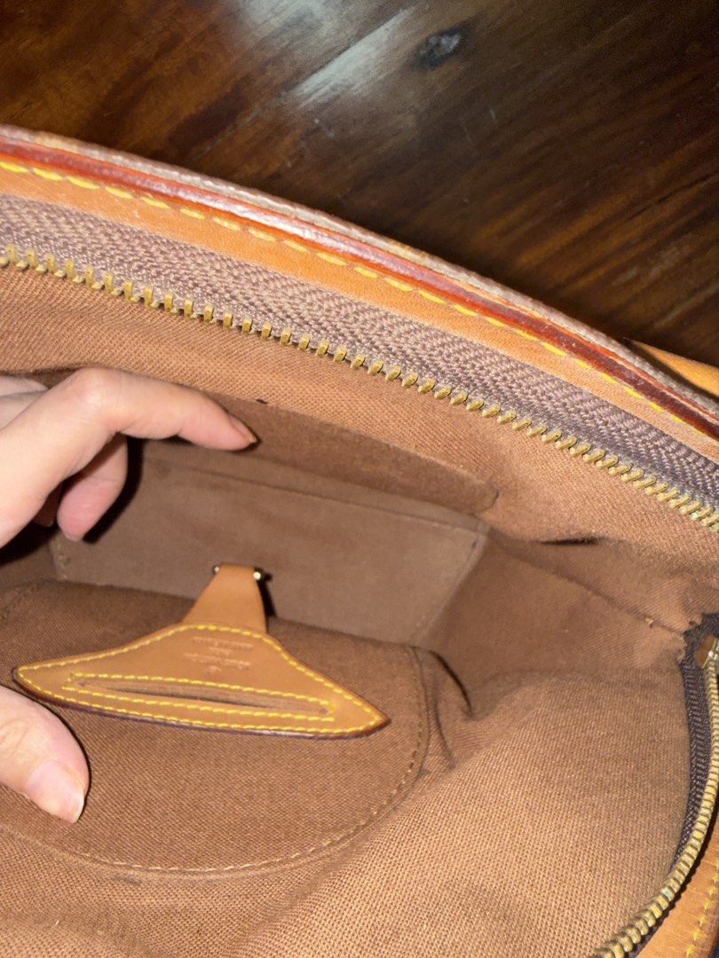 Louis Vuitton Monogram Ellipse Bag (Category: Luxury Bags & Wallets) located in Angeles City. Submitted by inahaldrienne (Listing ID 1460988654, Image 2). Description: - Classic Louis Vuitton Ellipse monogram bag - Color: Brown and tan canvas with leather trim - Closure: Zipper - Interior: One small pocket - Condition: Handles show wear, overall good vintage condition - A timeless and iconic piece.