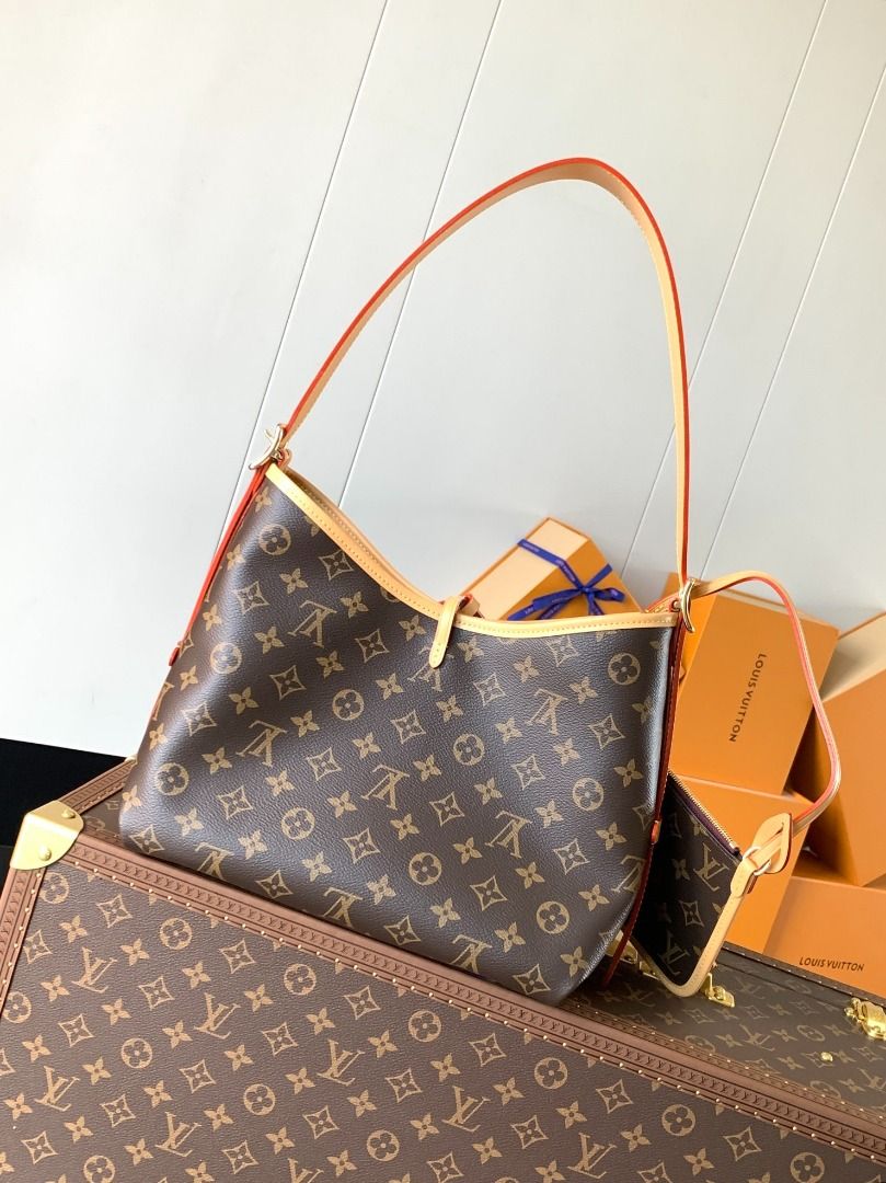 Louis Vuitton Monogram Hobo Bag with Pouch (Category: Shoulder Bags) located in Malabon City. Submitted by noblestar.dd62c6 (Listing ID 1460989646, Image 3). Description: Color-changing chip, top-tier original source The M46203 CarryAll handbag is made from Monogram canvas with leather trim, making it the perfect companion for city life. The spacious design features well-arranged inner compartments, with added functional pockets. The Monogram can