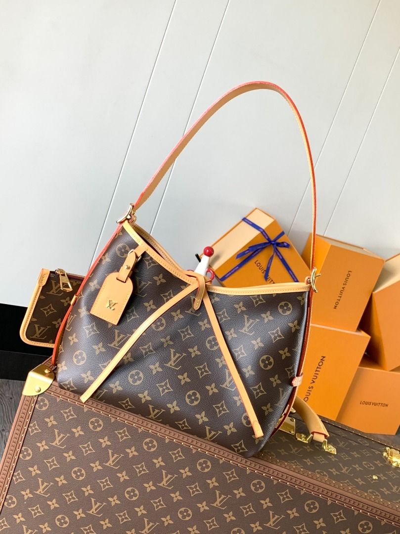 Louis Vuitton Monogram Hobo Bag with Pouch (Category: Shoulder Bags) located in Malabon City. Submitted by noblestar.dd62c6 (Listing ID 1460989646, Image 1). Description: Color-changing chip, top-tier original source The M46203 CarryAll handbag is made from Monogram canvas with leather trim, making it the perfect companion for city life. The spacious design features well-arranged inner compartments, with added functional pockets. The Monogram can
