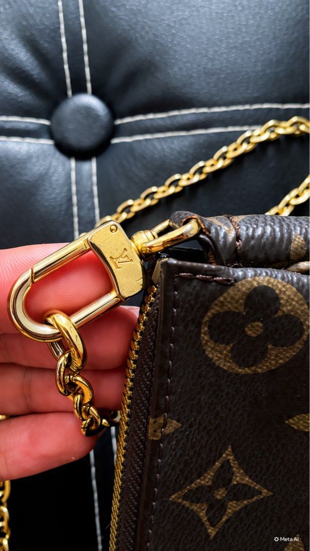 Louis Vuitton Monogram Pouch with Chain (Category: Luxury Bags & Wallets) located in Baguio. Submitted by elianaam. (Listing ID 1460923112, Image 2). Description: - Authentic Louis Vuitton pouch bag - Classic monogram canvas - Orange leather trim - Gold chain strap included - Zipper closure - Made in France - Date code: SP8159 - Ideal for carrying essentials.