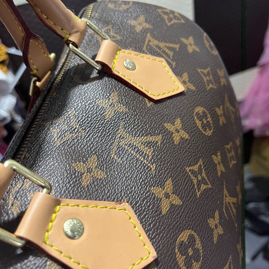 Louis Vuitton Monogram Speedy Bag (Category: Luxury Bags & Wallets) located in Cagayan de Oro. Submitted by kathkoleksyon (Listing ID 1461107682, Image 3). Description: - Iconic Louis Vuitton Speedy 25 - Classic monogram canvas - Smoothly functioning zipper - Clean interior - Not Coded - See last photo po sa issue nya.