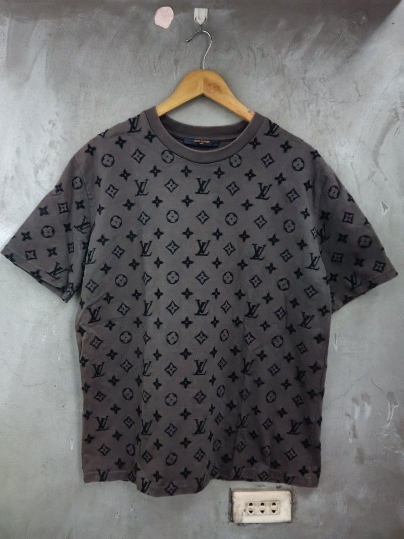 Louis Vuitton Monogram T-Shirt (Category: Tshirts & Polo Shirts ) located in Caloocan City. Submitted by arielagost83627 (Listing ID 1461018241, Image 1). Description: - Grey Louis Vuitton T-Shirt - All-over Monogram Print - Size: L - Made in Italy - Care: Gentle machine wash recommended, iron inside out (refer to care label) Color Rate: 9.5/10 Dimes: 22x28 Issue: Washable Stain Excellent Condition (Thick Fabric).