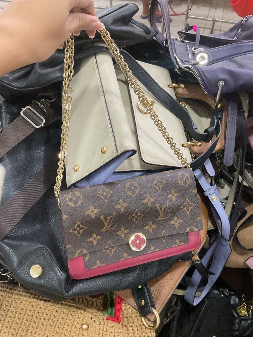 Louis Vuitton Monogram Wallet on Chain Fuchsia (Category: Luxury Bags & Wallets) located in Manila. Submitted by asianbellahadidd (Listing ID 1460999673, Image 1). Description: - Authentic Louis Vuitton Wallet on Chain - Classic Monogram Canvas - Vibrant Fuchsia Leather Trim & Interior - Gold Chain Strap - Multiple Card Slots - Interior Zippered Compartment - Front Pocket with Snap Closure - Made in France.