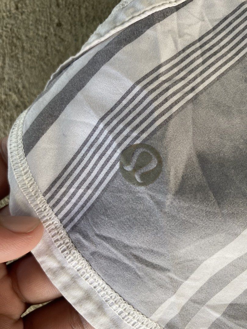 Lululemon Running Shorts Grey White Plaid (Category: Activewear) located in Sinait. Submitted by rinzuthrift (Listing ID 1460937026, Image 3). Description: - Lululemon running shorts - Grey and white plaid pattern - Black waistband with zippered pocket - Lightweight material - Perfect for workouts or casual wear - Comfortable fit.