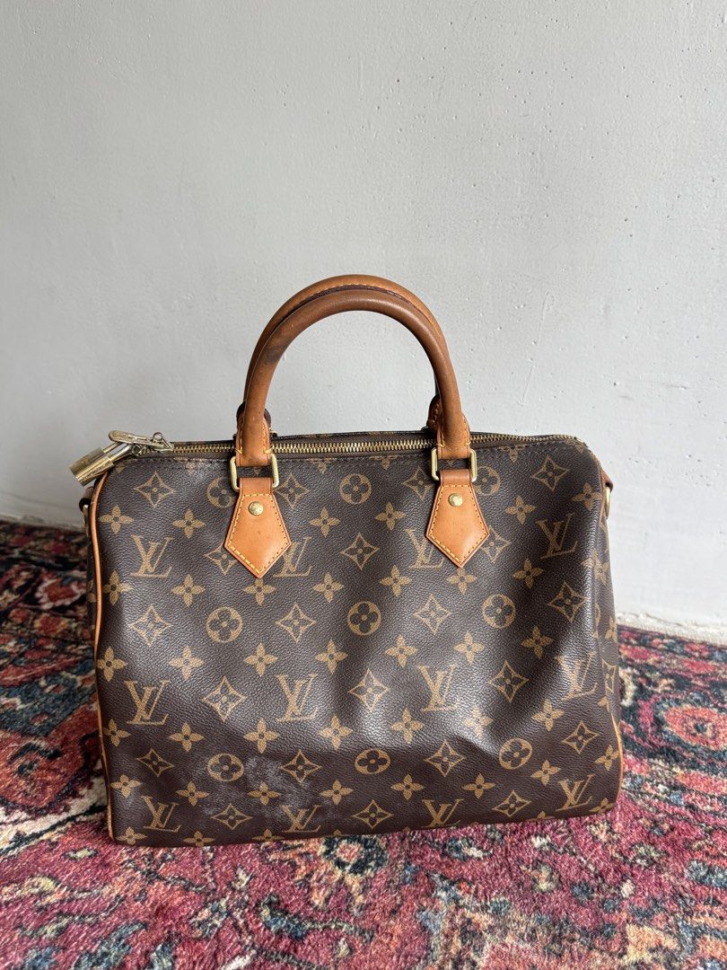 Lv speedy 30 (Category: Luxury Bags & Wallets) located in Quezon City. Submitted by streetgallerygarments (Listing ID 1460986282, Image 1). Description: classic Louis Vuitton Monogram Speedy 30 bag featuring the signature brown coated canvas and honey-toned leather top handles Condition Rank AB Issue check photo Missing sling/key Courier Jnt/LBC DHL express.