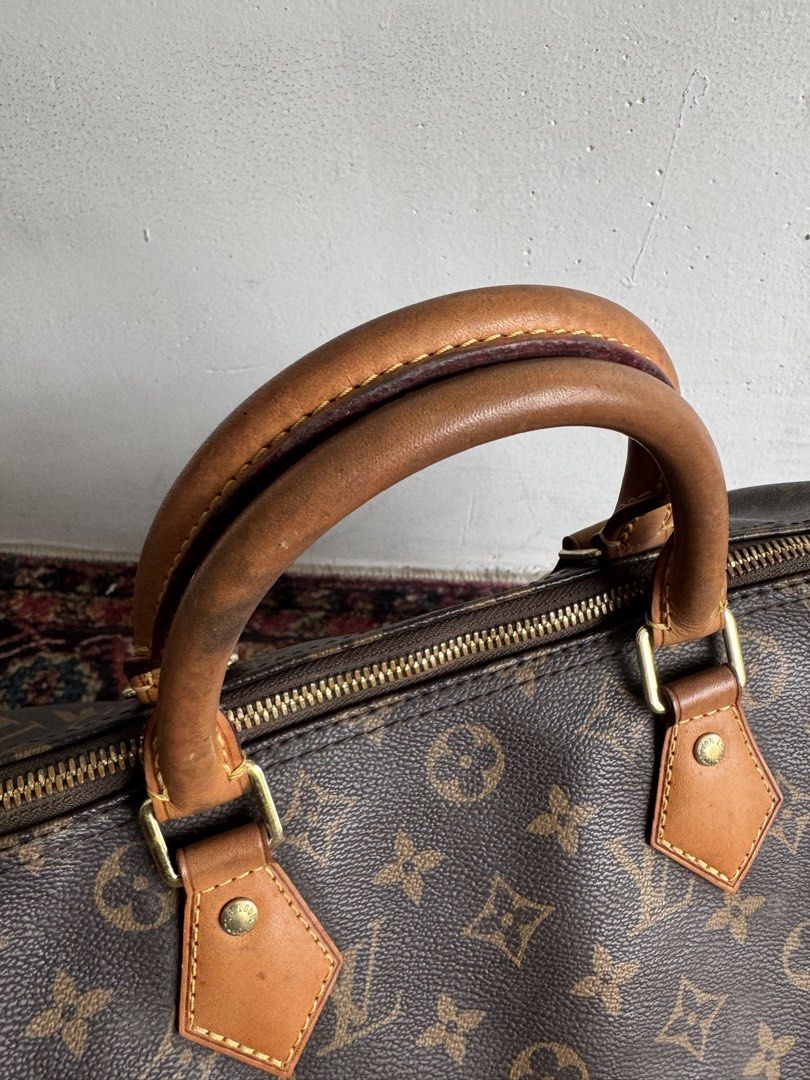 Lv speedy 30 (Category: Luxury Bags & Wallets) located in Quezon City. Submitted by streetgallerygarments (Listing ID 1460986282, Image 3). Description: classic Louis Vuitton Monogram Speedy 30 bag featuring the signature brown coated canvas and honey-toned leather top handles Condition Rank AB Issue check photo Missing sling/key Courier Jnt/LBC DHL express.