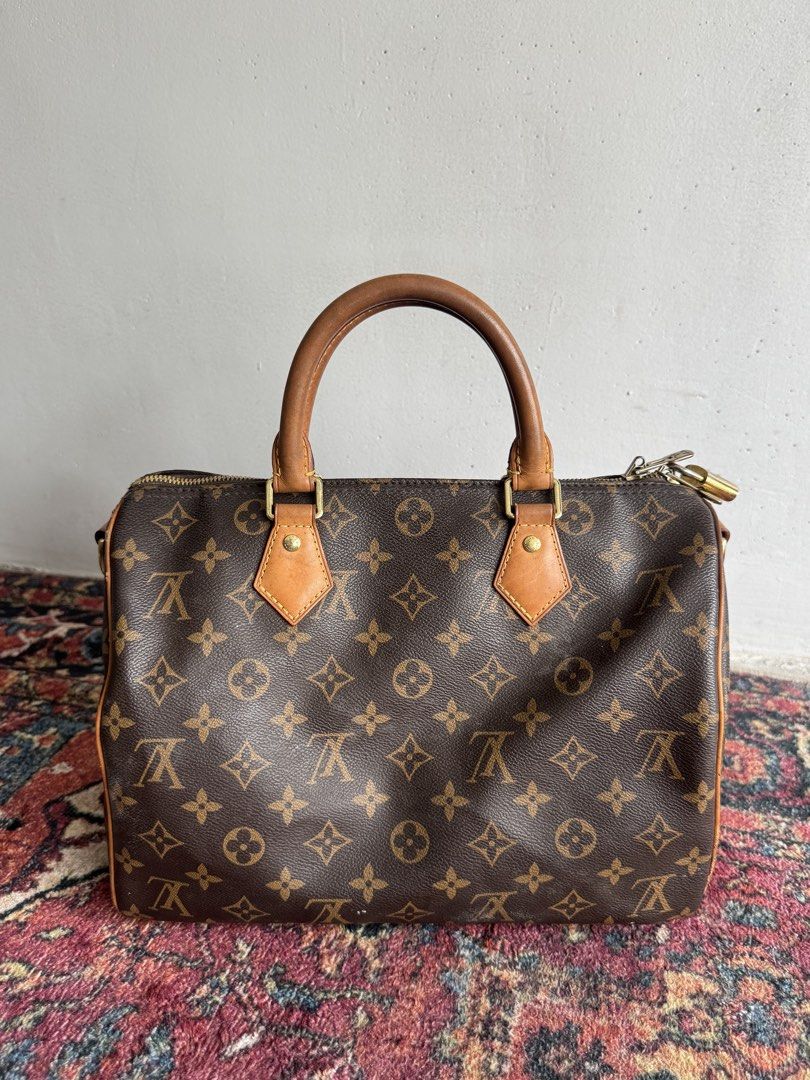 Lv speedy 30 (Category: Luxury Bags & Wallets) located in Quezon City. Submitted by streetgallerygarments (Listing ID 1460986282, Image 2). Description: classic Louis Vuitton Monogram Speedy 30 bag featuring the signature brown coated canvas and honey-toned leather top handles Condition Rank AB Issue check photo Missing sling/key Courier Jnt/LBC DHL express.