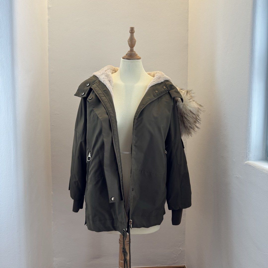 mango army green fleece lined jacket with detachable fur lining (Category: Coats, Jackets and Outerwear) located in Pasay City. Submitted by ultzen (Listing ID 1460937593, Image 2). Description: - mango army green fleece lined jacket - size M fits up to L - fur lining in the hoodie is detachable - super comfy - perfect for winter trips - 9/10 condition - rfs: decluttering mop: bpi / gcash / maribank mod: j&t / lbc / sdd (mnl).