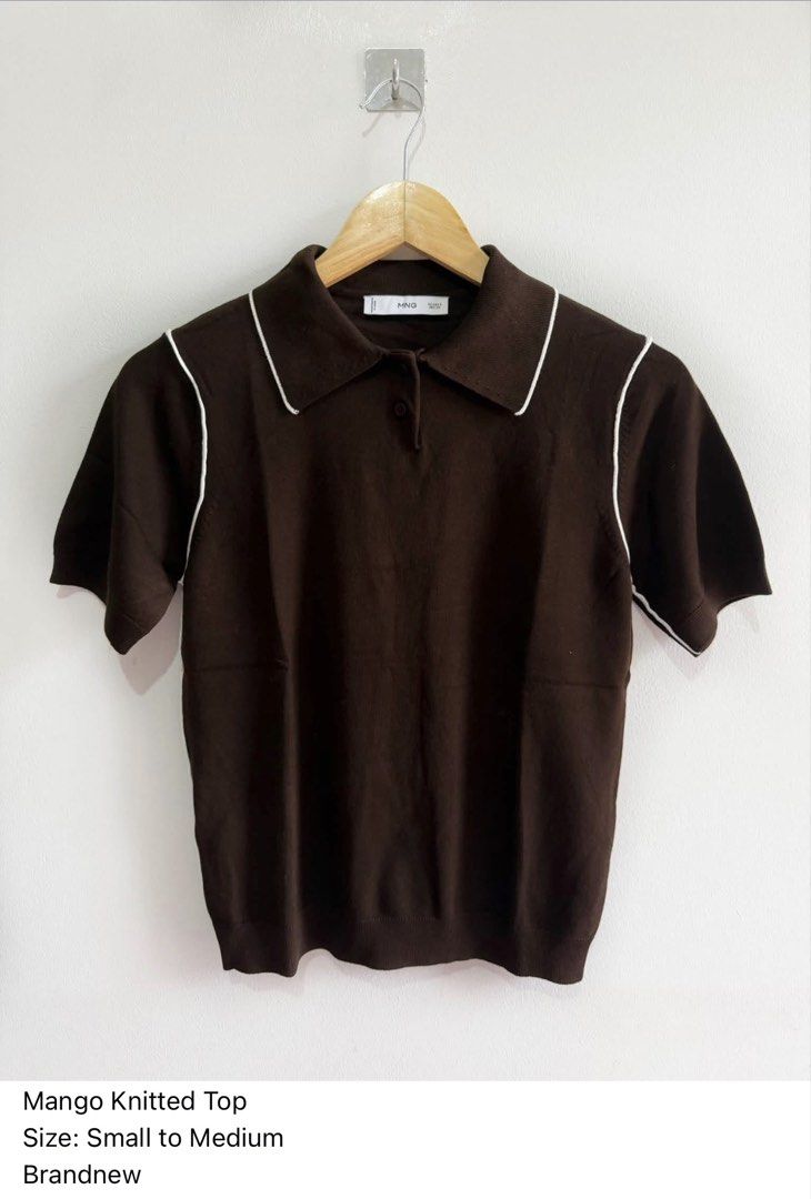 Mango Brown Knitted Polo Top (Category: Blouses) located in Paranaque City. Submitted by closetcoph (Listing ID 1460970094, Image 1). Description: - Brand: Mango - Style: Knitted Polo Top - Color: Brown - Details: White piping on collar and sleeves - Features: Short sleeves, collared neckline, button closure - Size: Best fits Small to Medium - Occasion: Ideal for casual or smart-casual wear.